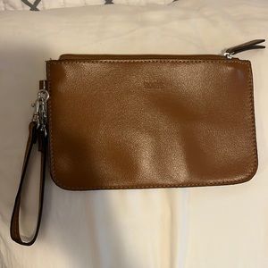 Roots leather wristlet
